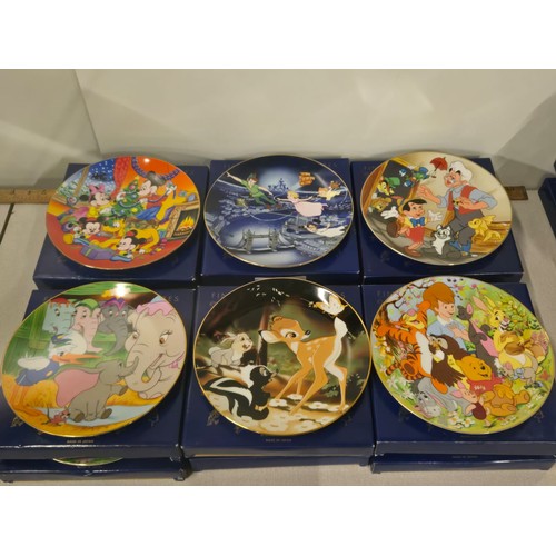 267 - 18 Boxed Disney Classics collector plates exclusively for Kenley's all with display stands.