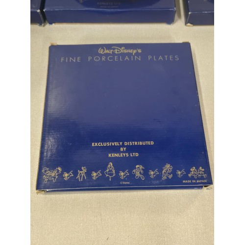 267 - 18 Boxed Disney Classics collector plates exclusively for Kenley's all with display stands.