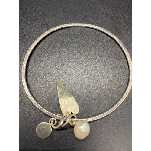 149 - 2  x silver 925 bangles to include classic round clasp and triple charm.