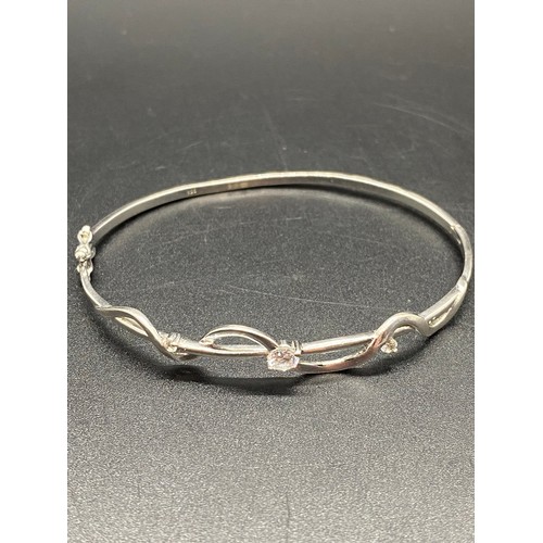 149 - 2  x silver 925 bangles to include classic round clasp and triple charm.