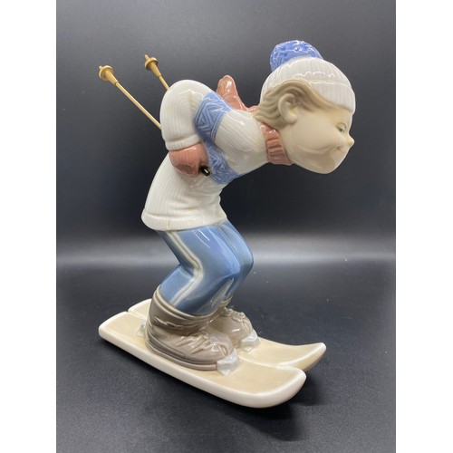 242 - Large Lladro boy skiing figure.