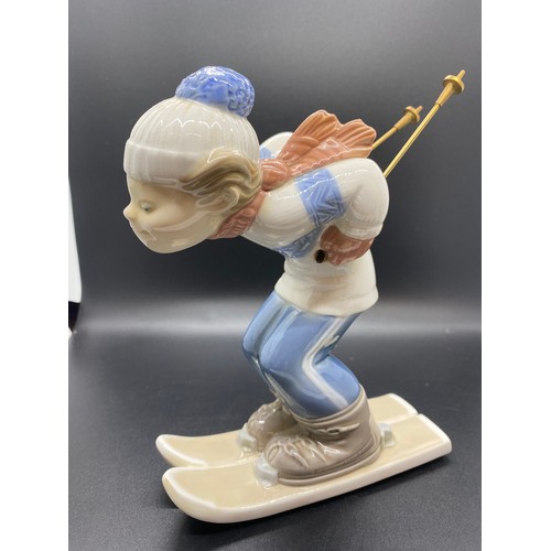 242 - Large Lladro boy skiing figure.