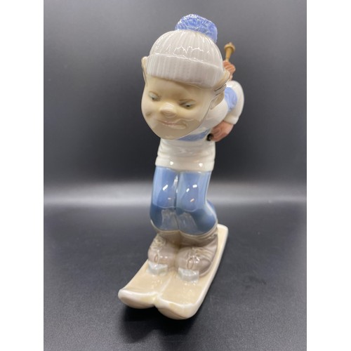 242 - Large Lladro boy skiing figure.