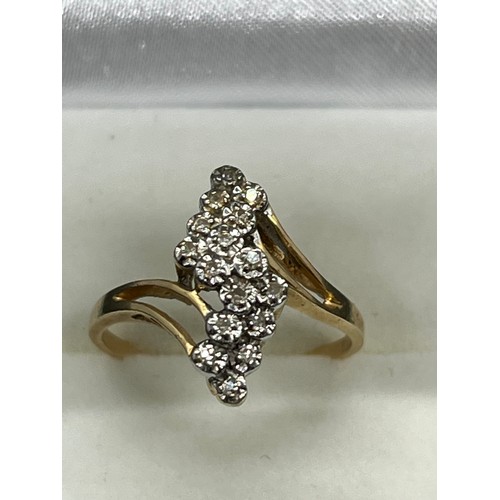 128 - 14k gold & diamond cluster ring