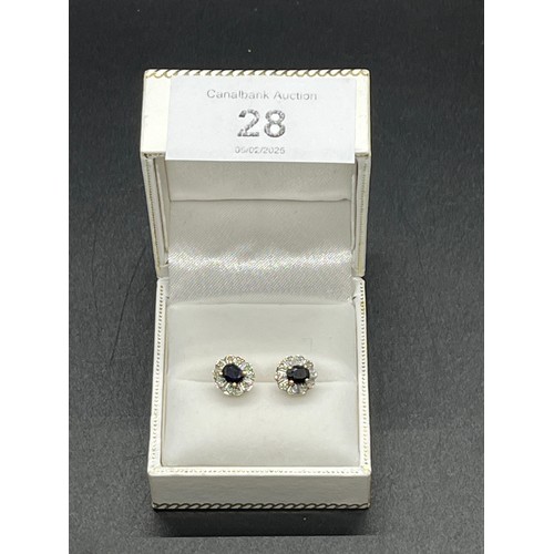 28 - A pair of 9ct gold & diamond earings