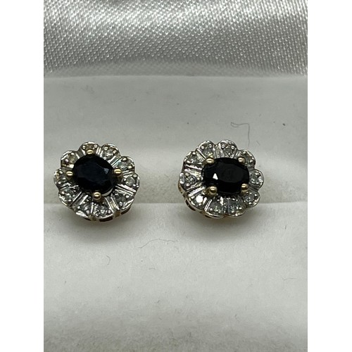 28 - A pair of 9ct gold & diamond earings