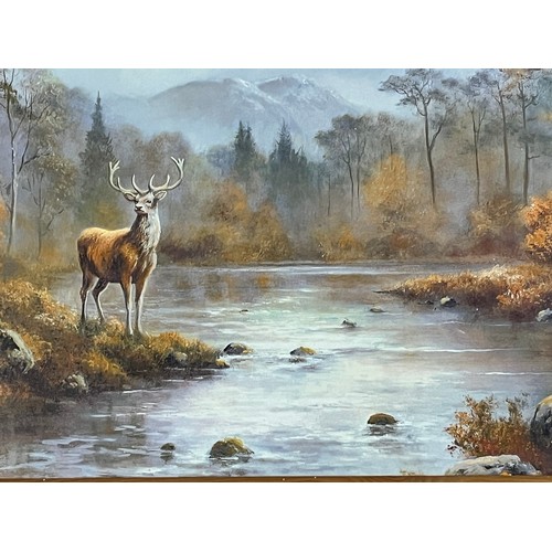 33 - A pair of large pine framed pictures of stags 22