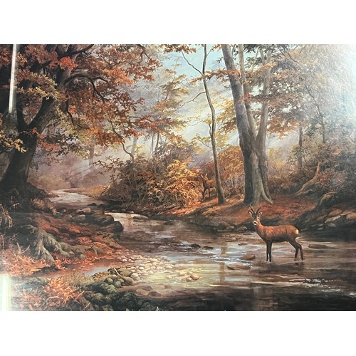 34 - A pair of large pine framed pictures of stags 42