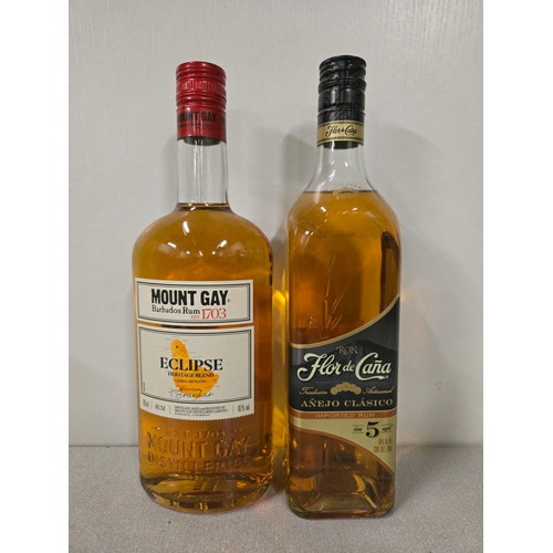 74 - 2 full & sealed 70cl bottles of rum to include Mount Gay & Flor de Cana.