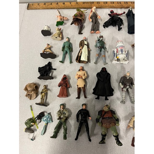 37 - Large collection of Star Wars figures & weapons from 1990s to include Darth Vader & Chewbacca etc.