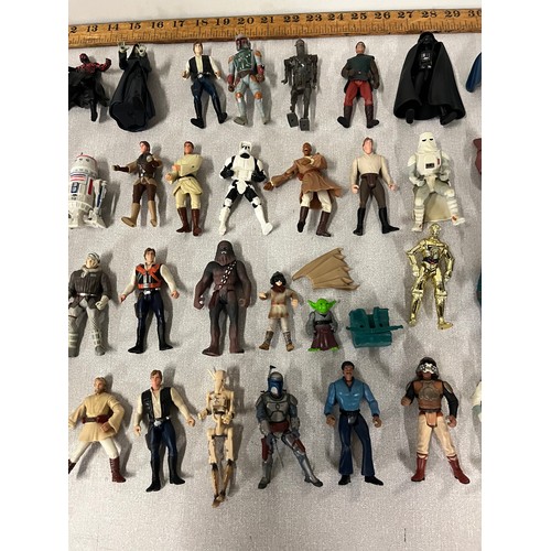 37 - Large collection of Star Wars figures & weapons from 1990s to include Darth Vader & Chewbacca etc.