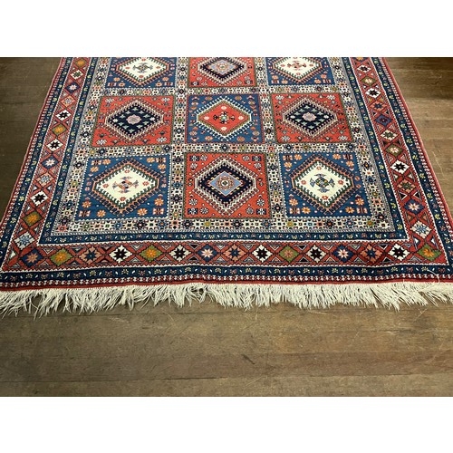 118 - A vintage persian hand knotted yalameh rug 
size 208cm x 238cm 100% wool,  geometric design 
excelle... 