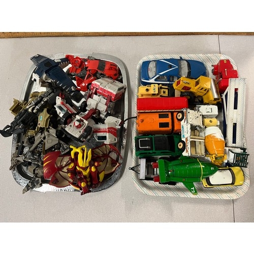 217 - Tray of playworn vehicles along with tray of transformers