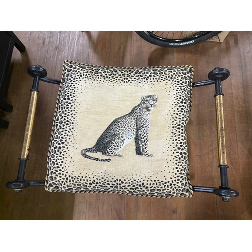 100 - Heavy Wrought iron curule stool/seat with cheetah cushion.
