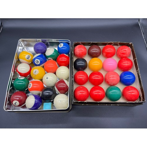 107 - 2 complete sets -snooker/billiard balls and pool balls.