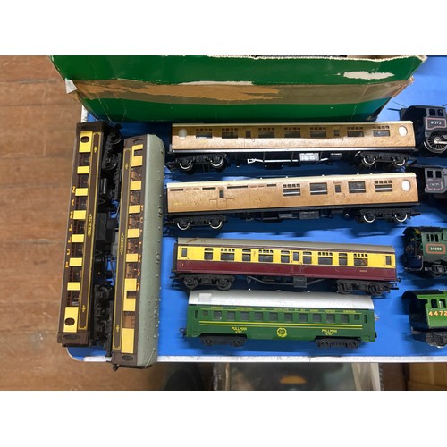 106 - Collection of railwayana to include engines (9), rolling stock, carriages and transformers etc.