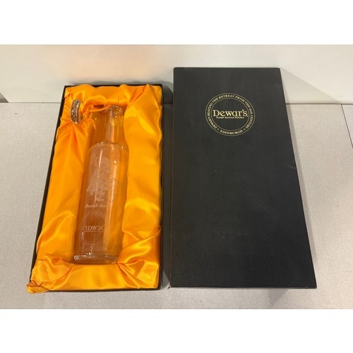 71 - Dewars finest scotch whiskey decanter in fitted box.