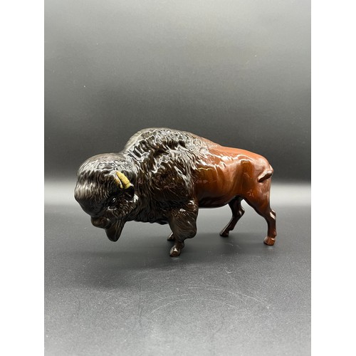 113 - Beswick Bison model No. 1019 by Arthur Gredington issued between 1945 and 1973. Has repair to one ho... 