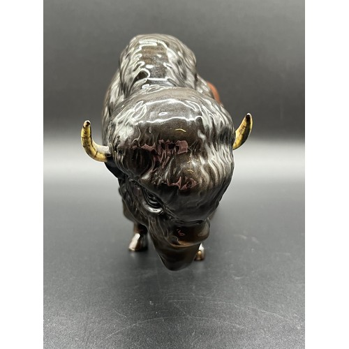 113 - Beswick Bison model No. 1019 by Arthur Gredington issued between 1945 and 1973. Has repair to one ho... 