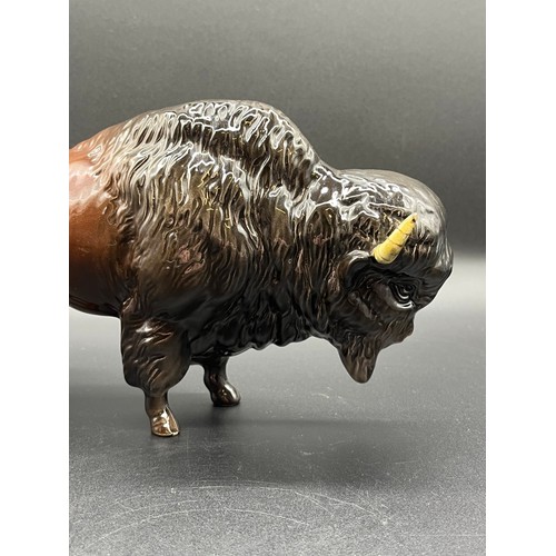 113 - Beswick Bison model No. 1019 by Arthur Gredington issued between 1945 and 1973. Has repair to one ho... 