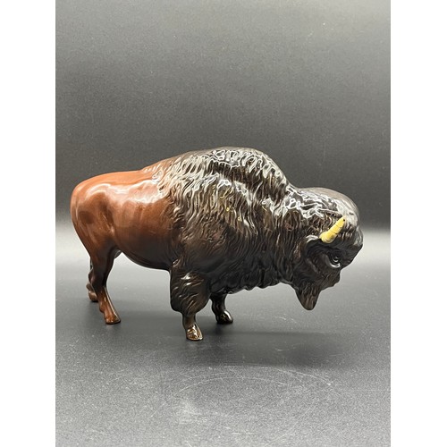 113 - Beswick Bison model No. 1019 by Arthur Gredington issued between 1945 and 1973. Has repair to one ho... 