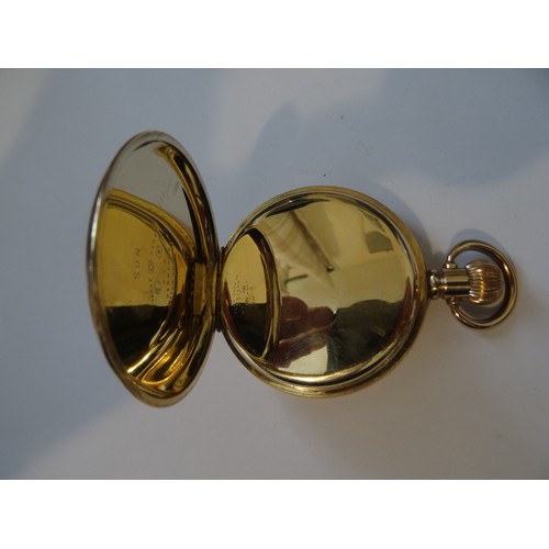 75 - Zenith hunter pocket watch in a gold plated case. The dial is free of hailrines or cracks the gold p... 