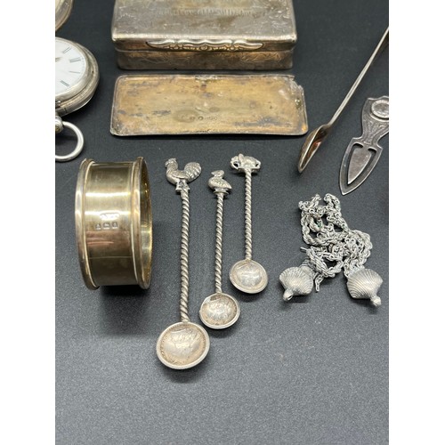 86 - Selection of silver items to include pocket watch, sugar tongs, napkin ring and Indian Rupee coin sp... 