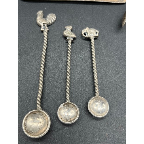 86 - Selection of silver items to include pocket watch, sugar tongs, napkin ring and Indian Rupee coin sp... 