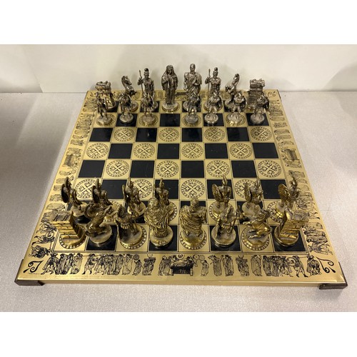 88 - Heavy metal Roman chess set and board (2 pawns missing)