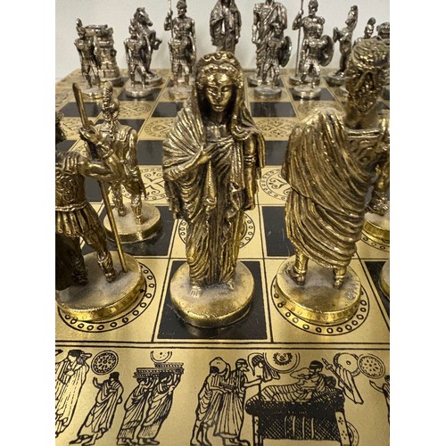 88 - Heavy metal Roman chess set and board (2 pawns missing)