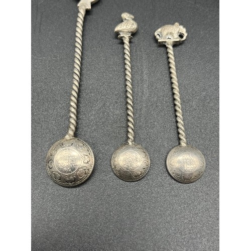 86 - Selection of silver items to include pocket watch, sugar tongs, napkin ring and Indian Rupee coin sp... 