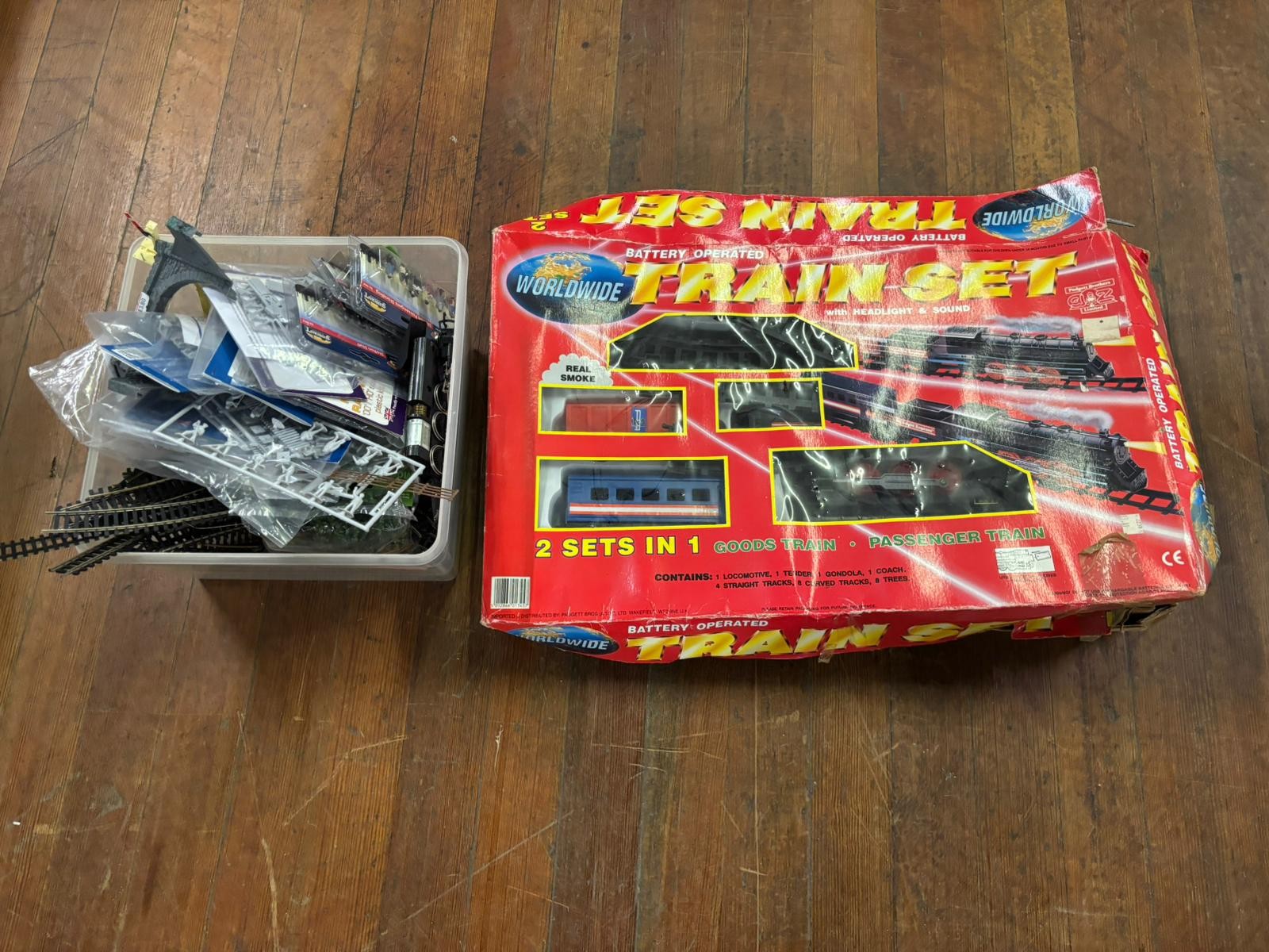 Worldwide battery operated train set along with box of loose train ...