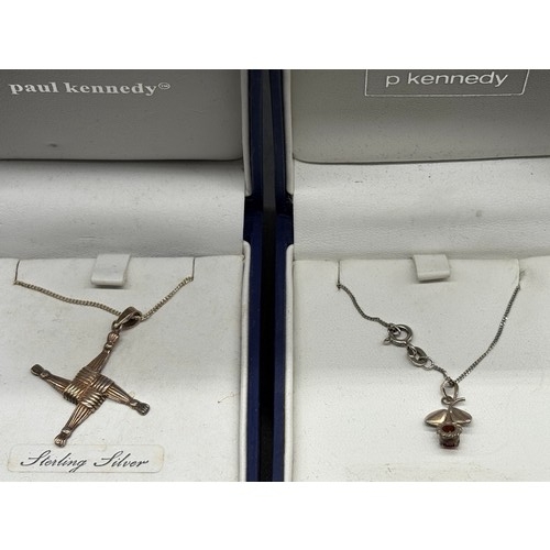 104 - 2 boxed hallmarked silver chain & pendants