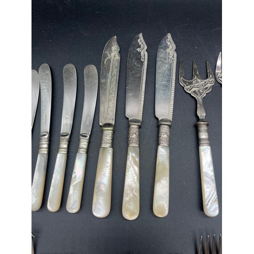 237 - Large collection of vintage mother of pearl handled cutlery.