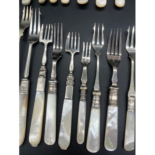 237 - Large collection of vintage mother of pearl handled cutlery.