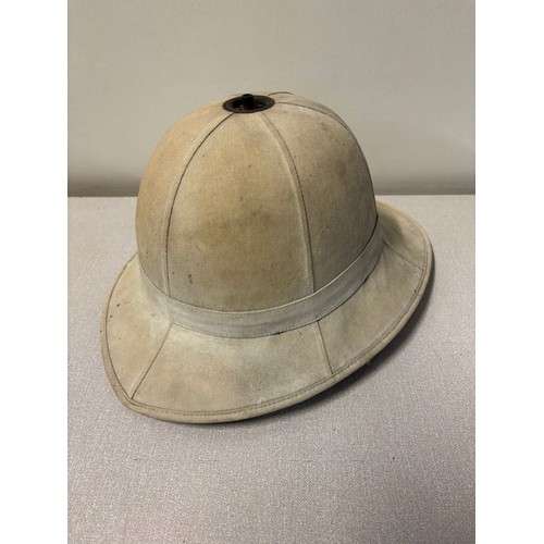 243 - British army desert DPM helmet along with a pith helmet.