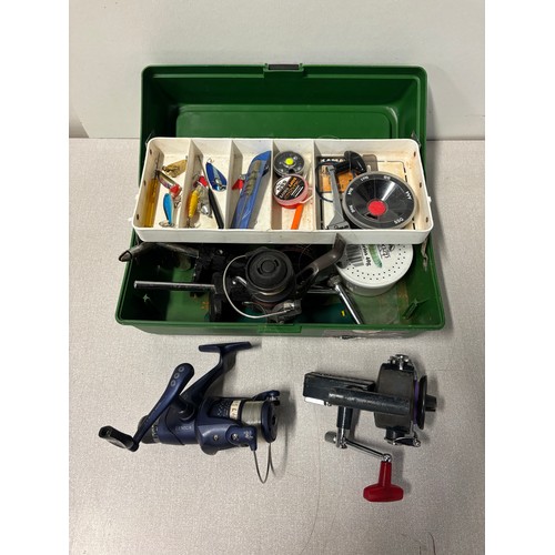 261 - Assortment of fishing tackle in box to include spinning reels, veniard fly tying vices etc.