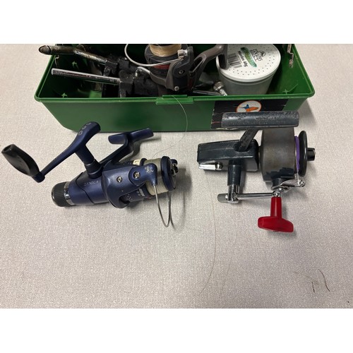 261 - Assortment of fishing tackle in box to include spinning reels, veniard fly tying vices etc.