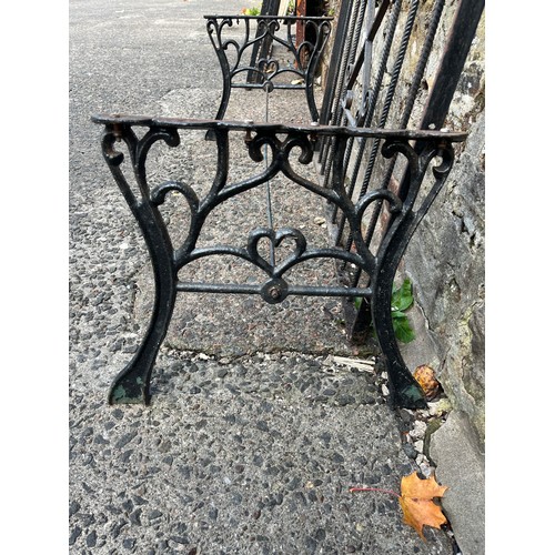 381 - Pair of ornate cast iron table legs along with vintage wrought iron garden gate, 35.5x30
