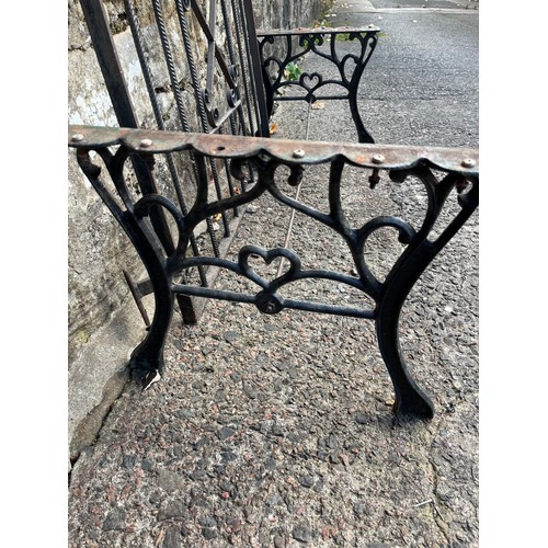 381 - Pair of ornate cast iron table legs along with vintage wrought iron garden gate, 35.5x30