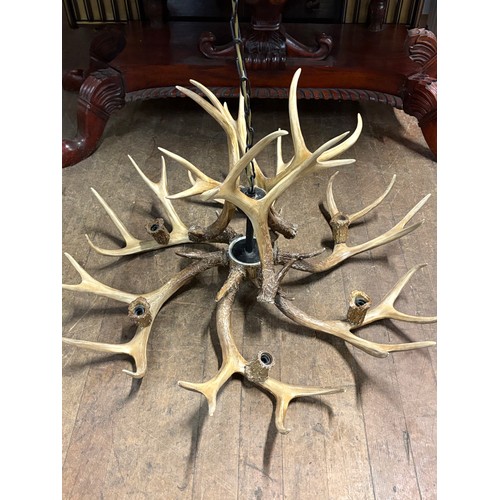 106 - Large rustic antler chandelier made with replicated deer antlers, with 6 light fittings. (complete)
