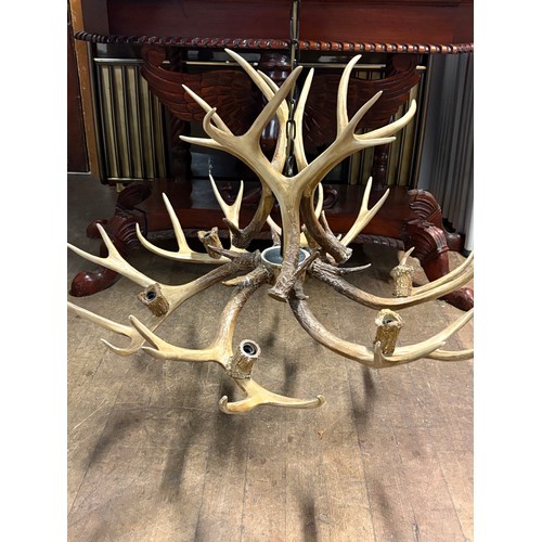 106 - Large rustic antler chandelier made with replicated deer antlers, with 6 light fittings. (complete)
