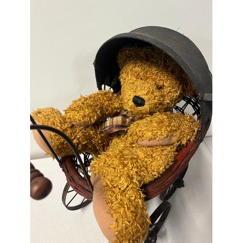 258 - Vintage Victorian style wicker and metal doll pram along with German Sunkid teddy bear.