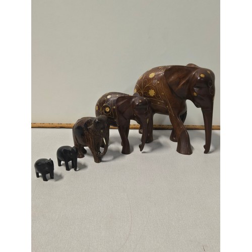 239 - Selection of solid wood elephants to include inlaid, Tallest approx 8