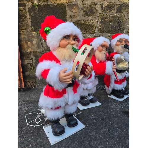 270 - Animatronic Christmas Santa & Band to include Singer, Drummer, Recorder, Guitar & tambourine players... 