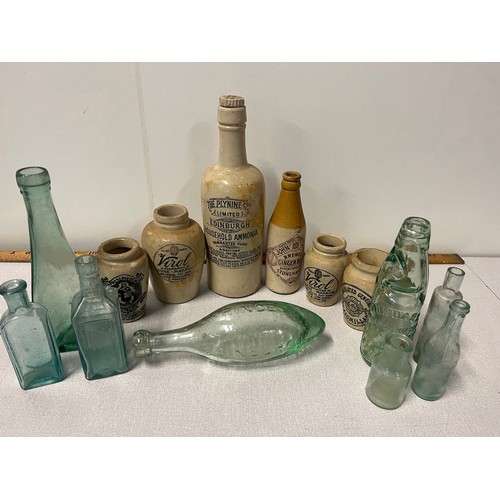 366 - Collection of antique advertising stoneware bottles and jars along with antique glass bottles to inc... 