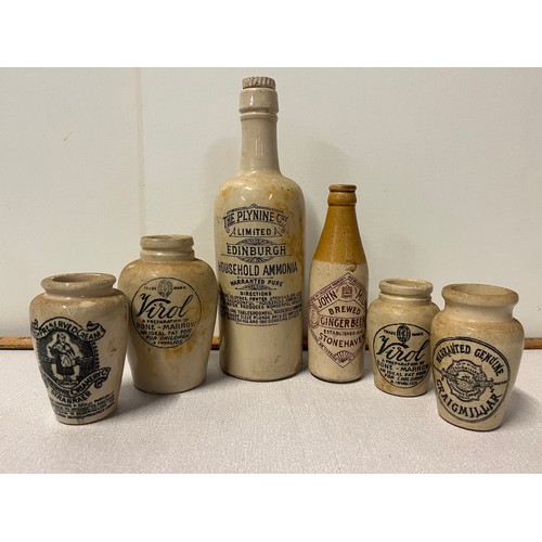 366 - Collection of antique advertising stoneware bottles and jars along with antique glass bottles to inc... 