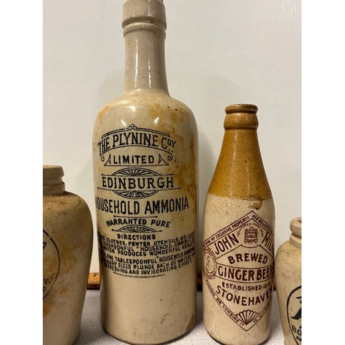 366 - Collection of antique advertising stoneware bottles and jars along with antique glass bottles to inc... 