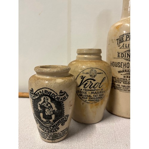 366 - Collection of antique advertising stoneware bottles and jars along with antique glass bottles to inc... 