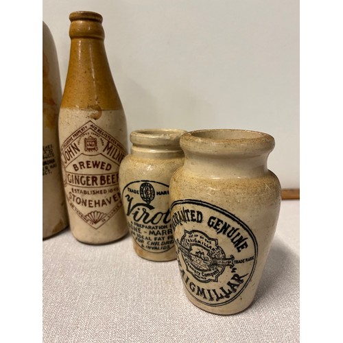 366 - Collection of antique advertising stoneware bottles and jars along with antique glass bottles to inc... 